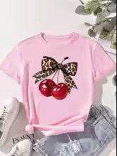 Add a Splash of Fun to Your Wardrobe with This Playful T-Shirt Featuring a Charming Cherry Print and a Sweet Southern Couture Bow - Just The Fly Way