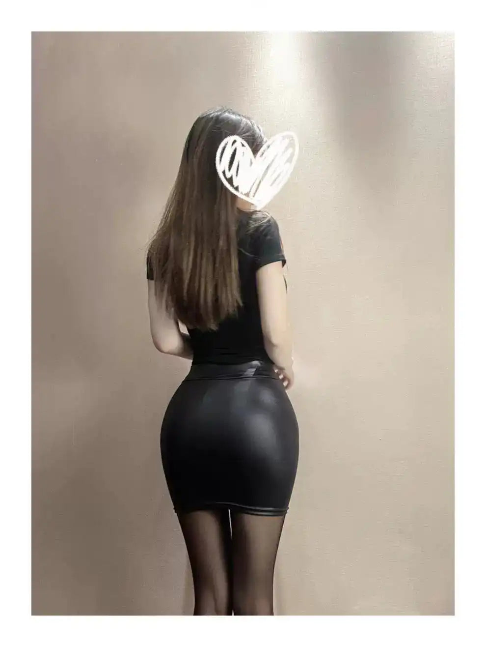 Turn Heads Effortlessly in this Sleek Black Faux Leather Skirt That Flatters Every Curve. - Just The Fly Way