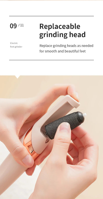 Electric foot grinder with replaceable grinding head being held by a hand on a beige background.