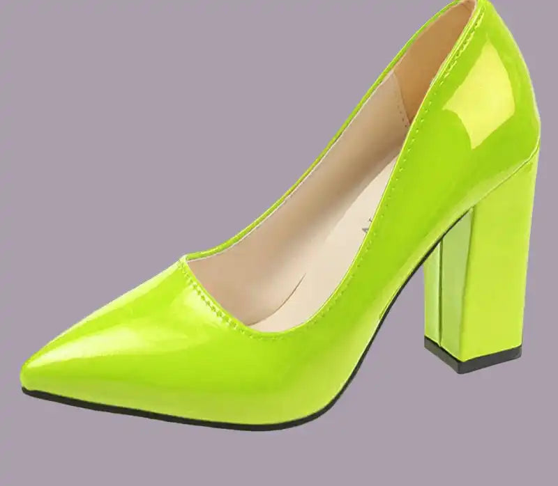 Green high-heeled shoe on a white background with 'Aphixta' branding.