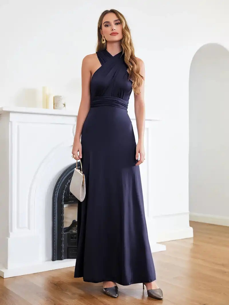 Bridesmaid Dress - Convertible Gown in navy blue with halter neckline and sleeveless design. Floor-length multiway wrap style by BABYONLINE.