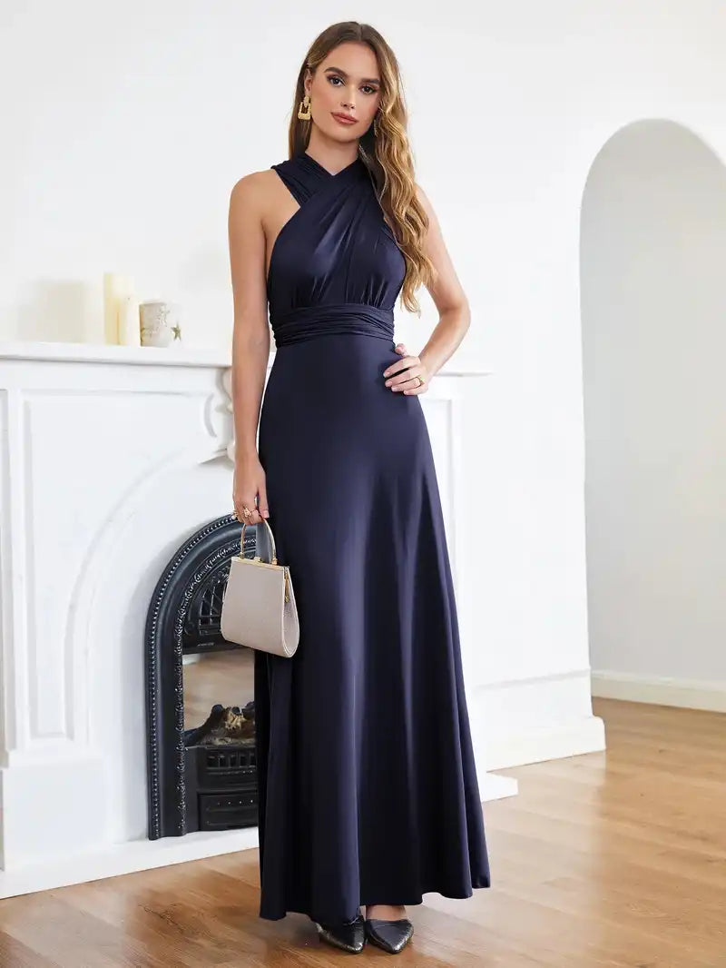 Bridesmaid Dress - Convertible Gown in navy blue with halter neckline and sleeveless design. Floor-length wrap style ideal for weddings or formal events.