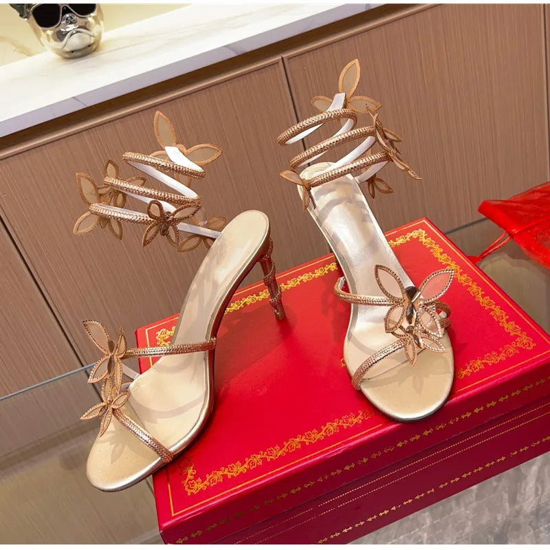 Fashionable, Bold and Beautiful DressLuxury Crystal Embellished Butterfly Detail Women Sandals Sexy Coiled Strap Thin High heels Gladiator sandals Summer Party Shoes