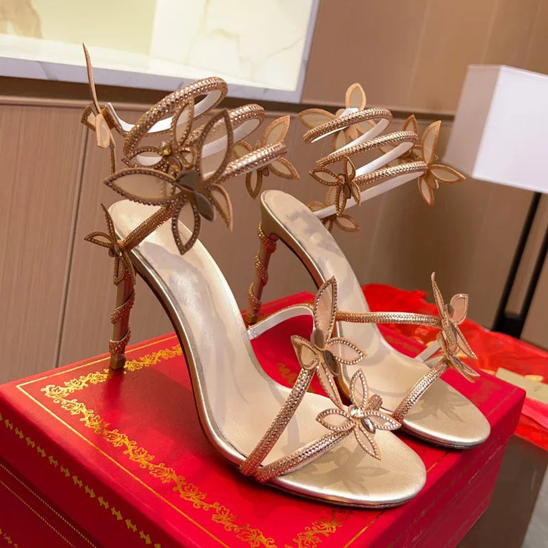 Fashionable, Bold and Beautiful DressLuxury Crystal Embellished Butterfly Detail Women Sandals Sexy Coiled Strap Thin High heels Gladiator sandals Summer Party Shoes