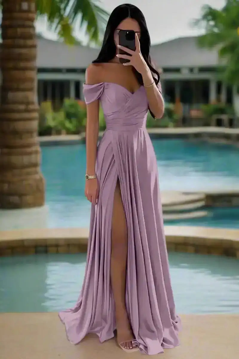 Lavender off shoulder satin evening gown with pleated skirt and thigh-high slit, styled for poolside or outdoor weddings.