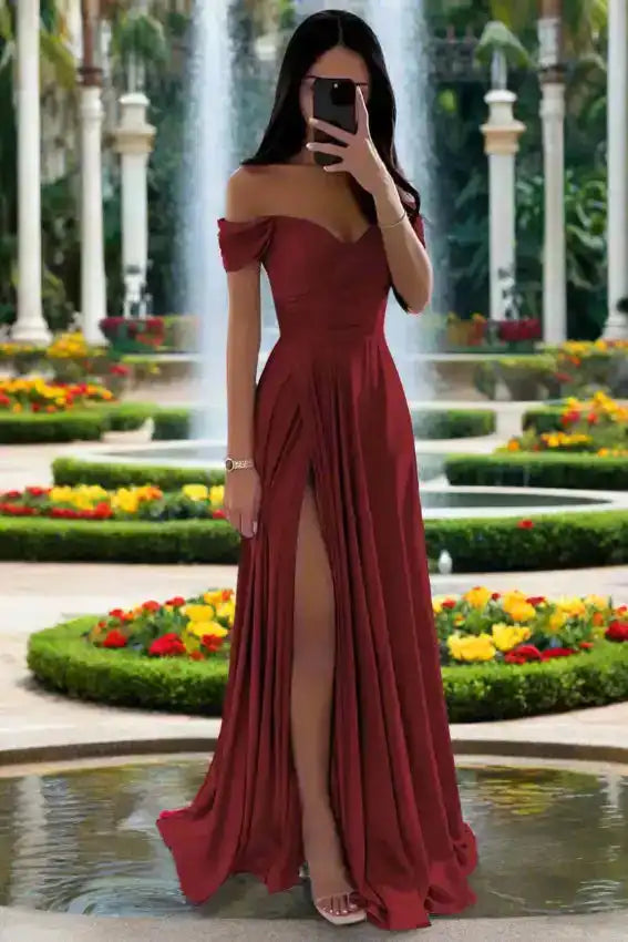 Rust red off shoulder formal dress with pleated satin A-line skirt and high slit, perfect for weddings or evening events.