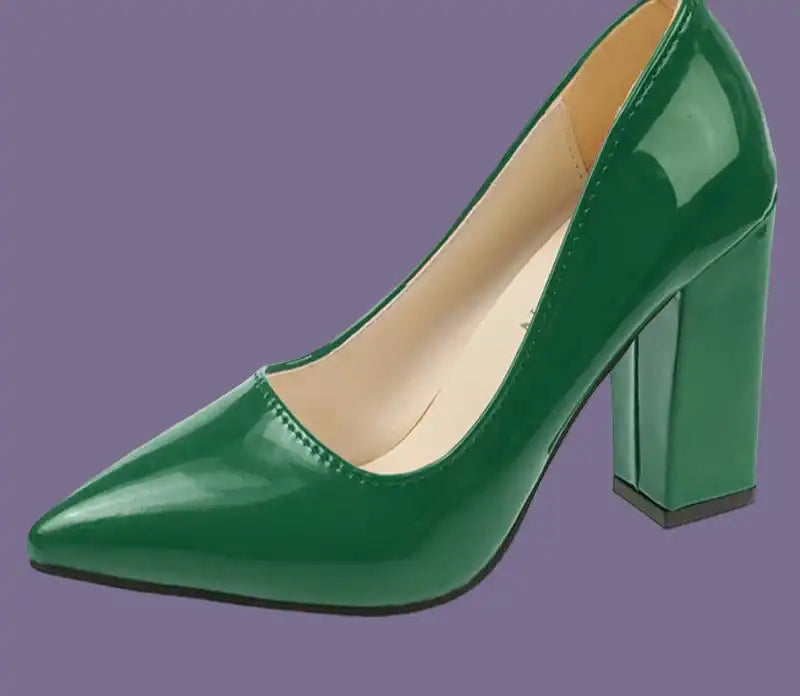 Green high-heeled shoe on a white background with 'Aphixta' branding.