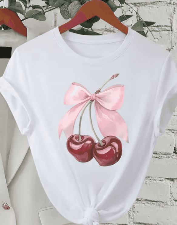 Add a Splash of Fun to Your Wardrobe with This Playful T-Shirt Featuring a Charming Cherry Print and a Sweet Southern Couture Bow - Just The Fly Way
