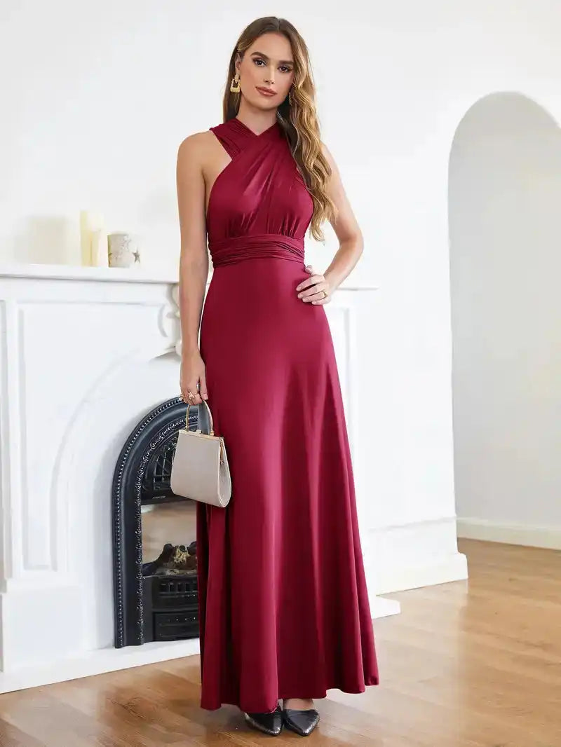 Bridesmaid Dress - Convertible Gown in burgundy with halter neckline and sleeveless design. Floor-length multiway wrap style by BABYONLINE.