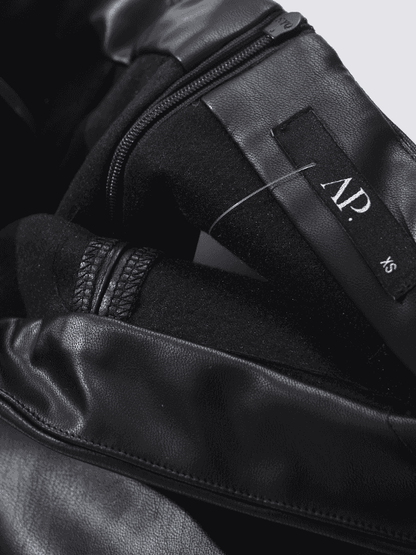 Be Bold in This Low Rise Black Mini Faux Leather Skort - Just The Fly Way