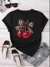 Add a Splash of Fun to Your Wardrobe with This Playful T-Shirt Featuring a Charming Cherry Print and a Sweet Southern Couture Bow - Just The Fly Way