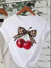 Add a Splash of Fun to Your Wardrobe with This Playful T-Shirt Featuring a Charming Cherry Print and a Sweet Southern Couture Bow - Just The Fly Way