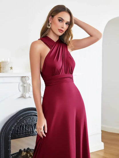 Bridesmaid Dress - Convertible Gown in burgundy with halter neckline and sleeveless design. Floor-length wrap style ideal for weddings or formal events.