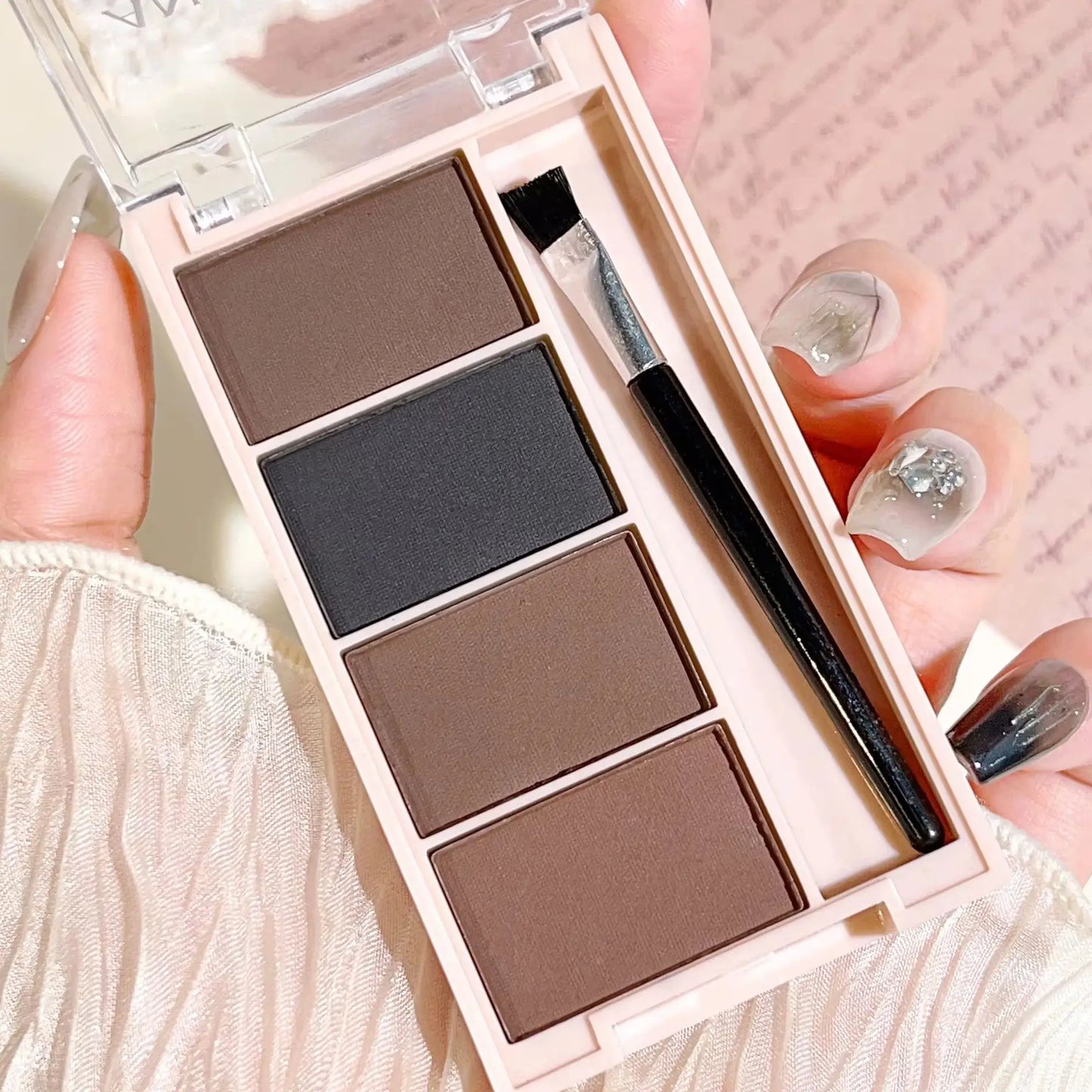Fashionable, Bold and Beautiful DressA set of 4-color eyebrow powder trays with brushes in gray and brown matte tones for long-lasting color rendering, filling and s