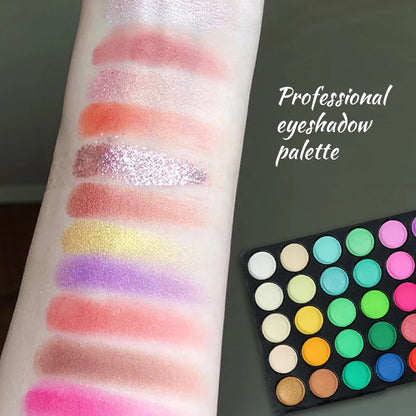 Professional eyeshadow palette with swatches on a arm and the palette itself.
