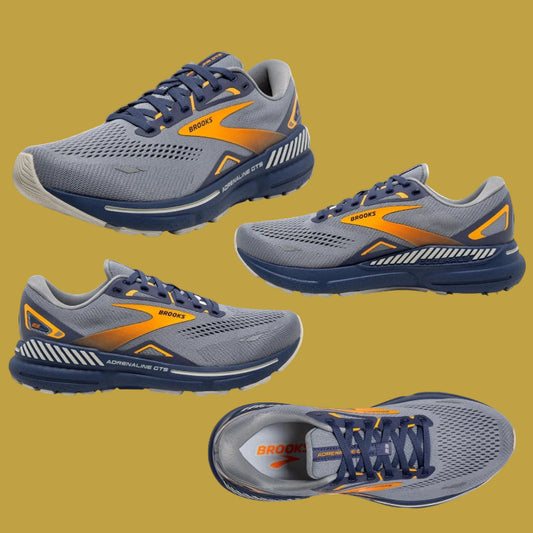 Gray and blue running shoes with orange accents, featuring the Brooks Adrenaline GTS 23 logo.