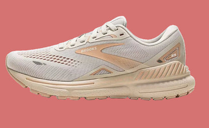 Gray and beige running shoe with 'Brooks' branding on a white background