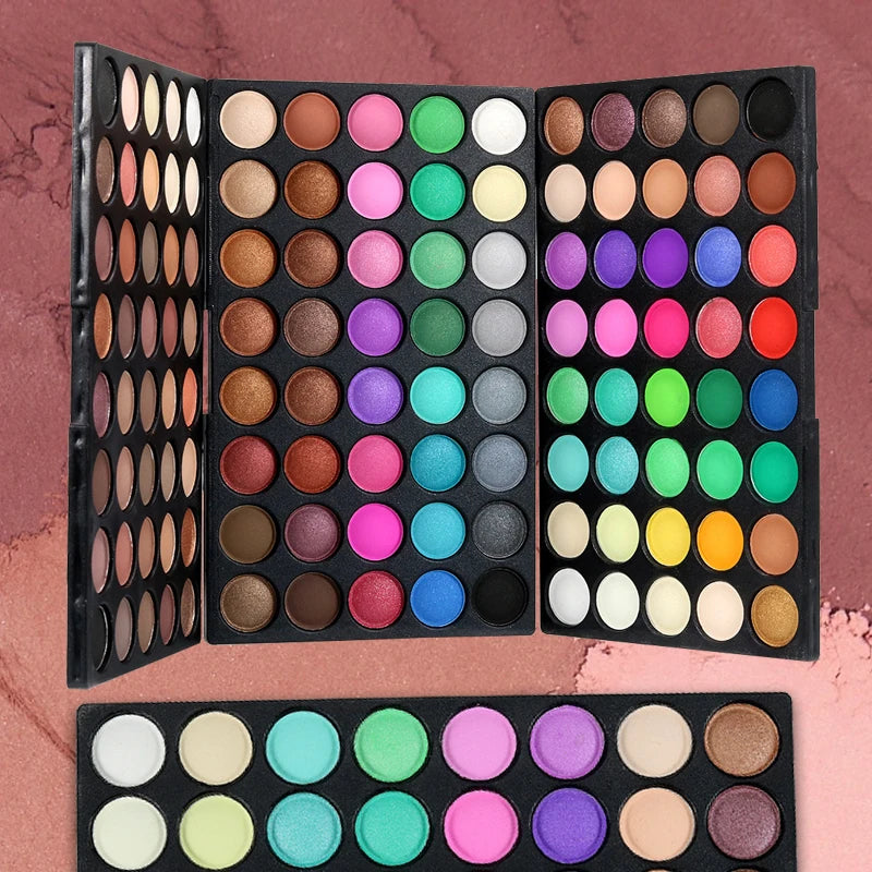Makeup palettes with a variety of colors on a textured background