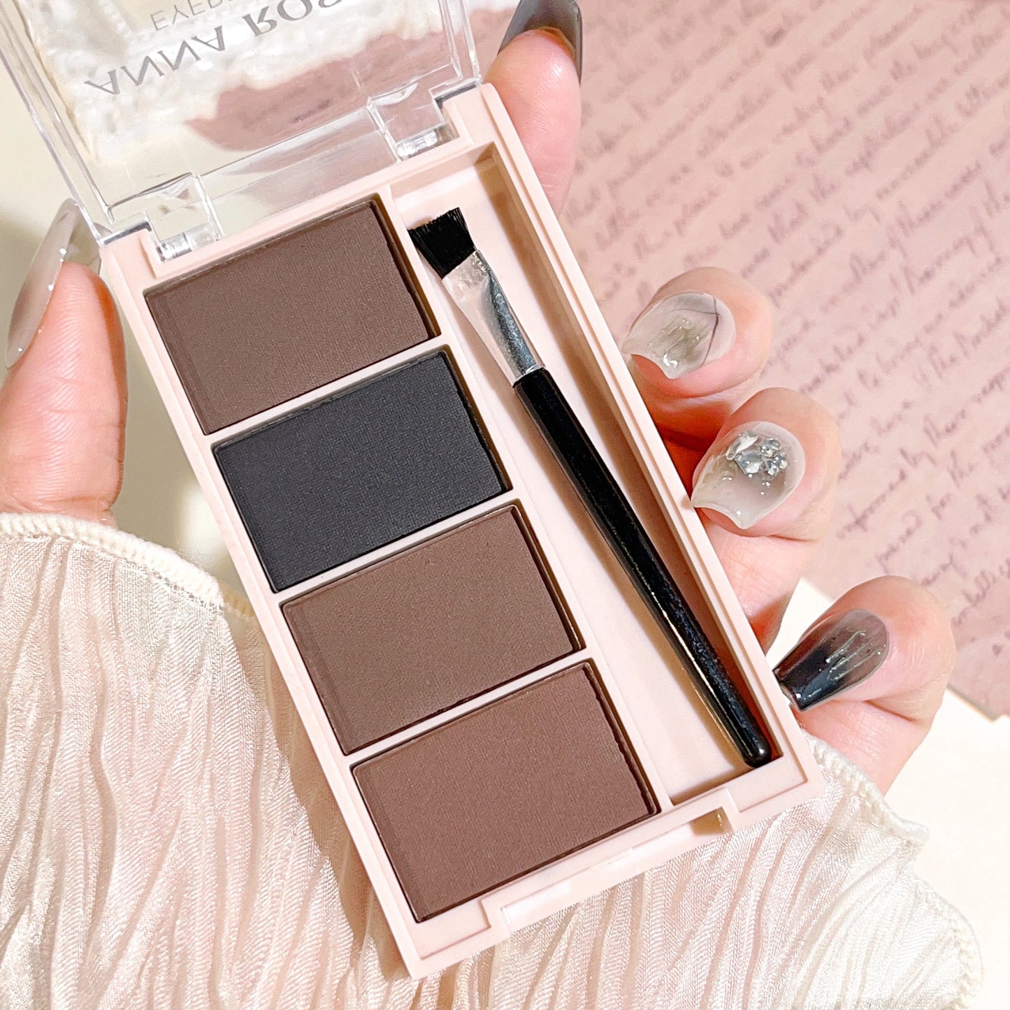 Fashionable, Bold and Beautiful DressA set of 4-color eyebrow powder trays with brushes in gray and brown matte tones for long-lasting color rendering, filling and s