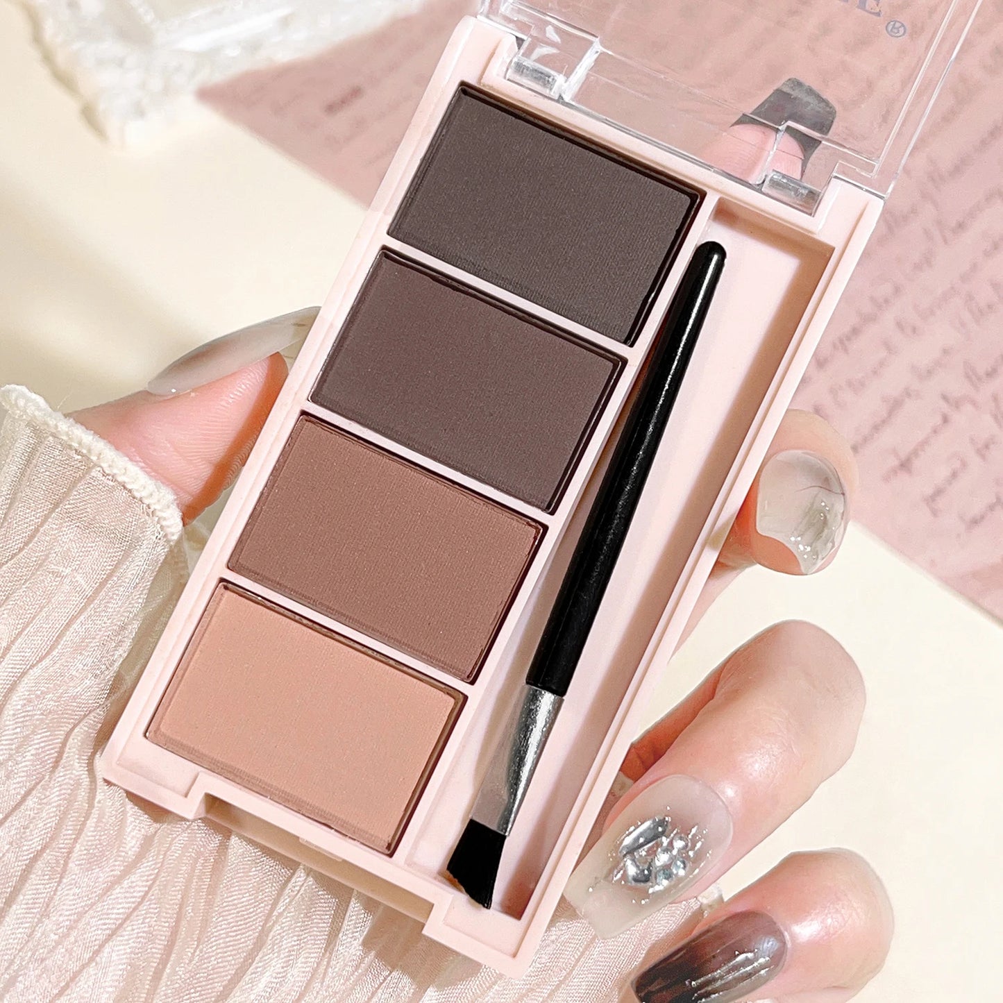 Fashionable, Bold and Beautiful DressA set of 4-color eyebrow powder trays with brushes in gray and brown matte tones for long-lasting color rendering, filling and s