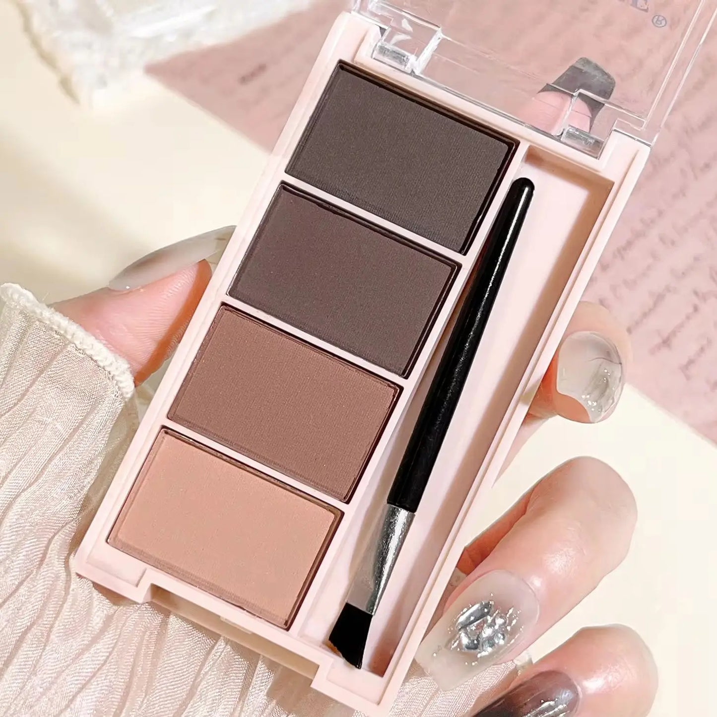 Fashionable, Bold and Beautiful DressA set of 4-color eyebrow powder trays with brushes in gray and brown matte tones for long-lasting color rendering, filling and s