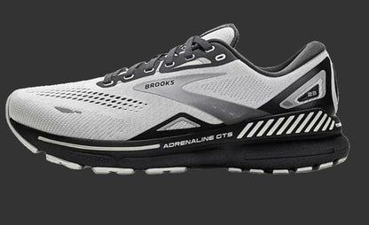 Gray and black running shoe with 'Brooks' branding on a white background