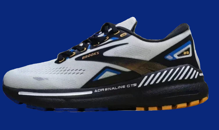 White running shoe with black and blue accents on a white background