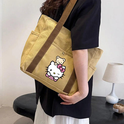 Hello Kitty Large Capacity Canvas Tote Available in Black, Beige, or Mustard, With A Variety Of Style Options - Just The Fly Way