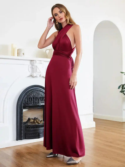Bridesmaid Dress - Convertible Gown in burgundy by BABYONLINE featuring a sleeveless halter V-neckline and floor-length multiway wrap design. Ideal for weddings or formal events.