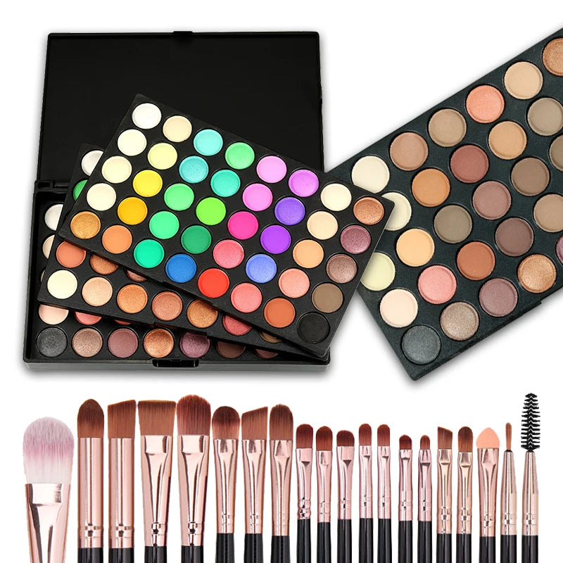 Makeup palette with colorful shades, brushes, and a brow brush on a white background